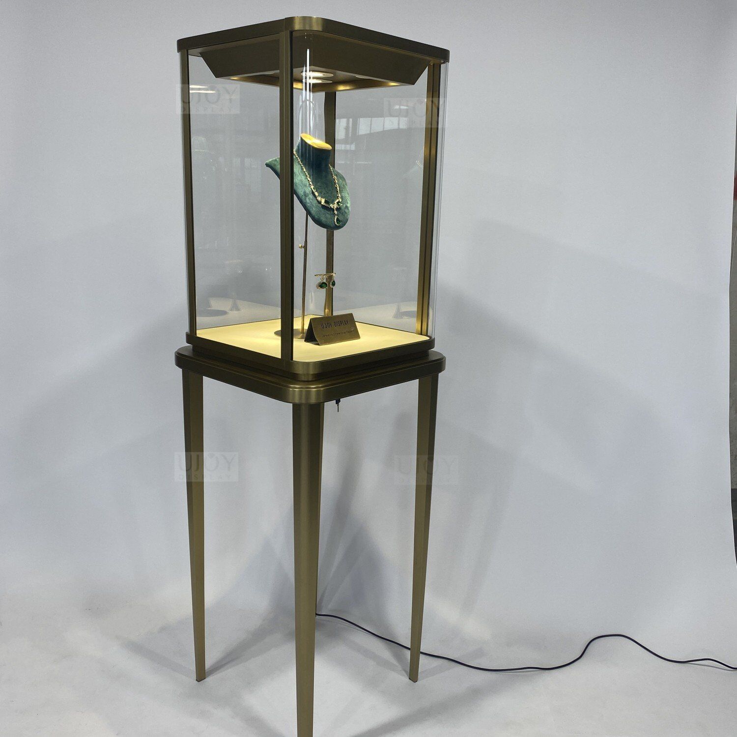 side view of Best Seller Curved Glass Jewelry Showcase Tower Display UD010 (3) side view of Best Seller Curved Glass Jewelry Showcase Tower Display UD010 (3)